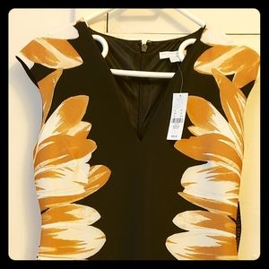 Black and gold sleeveless dress